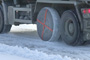 Truck driving in snow with AutoSock snow socks