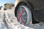 Van tyre with AutoSock snow socks on